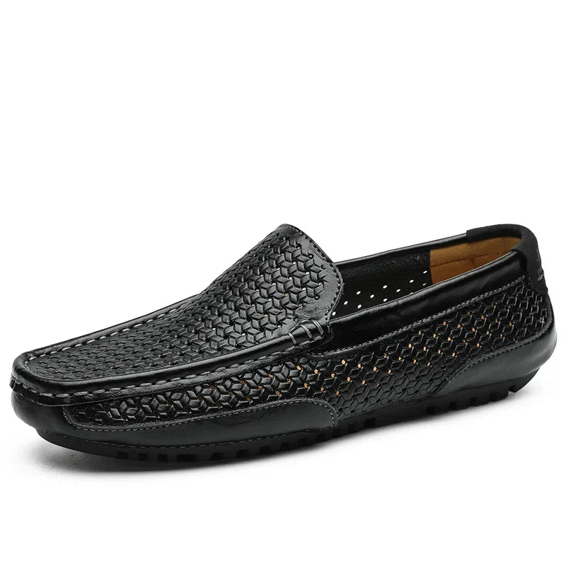 Close-up of men's perforated slip-on loafers, highlighting texture and breathable design.