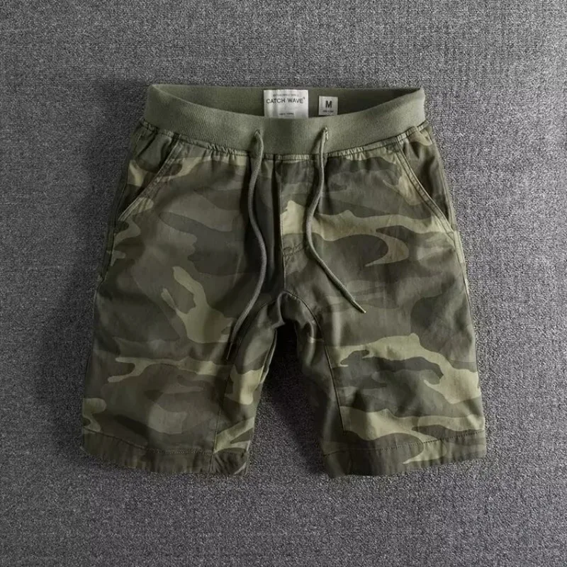 Durable & flexible men's athletic camouflage shorts for intense gym training & outdoor sportswear.