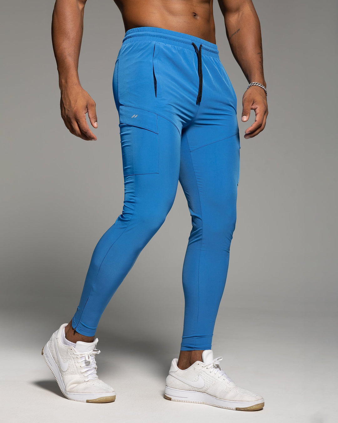 Relaxed fit men's lounge pants, comfortable performance joggers perfect for unwinding at home.