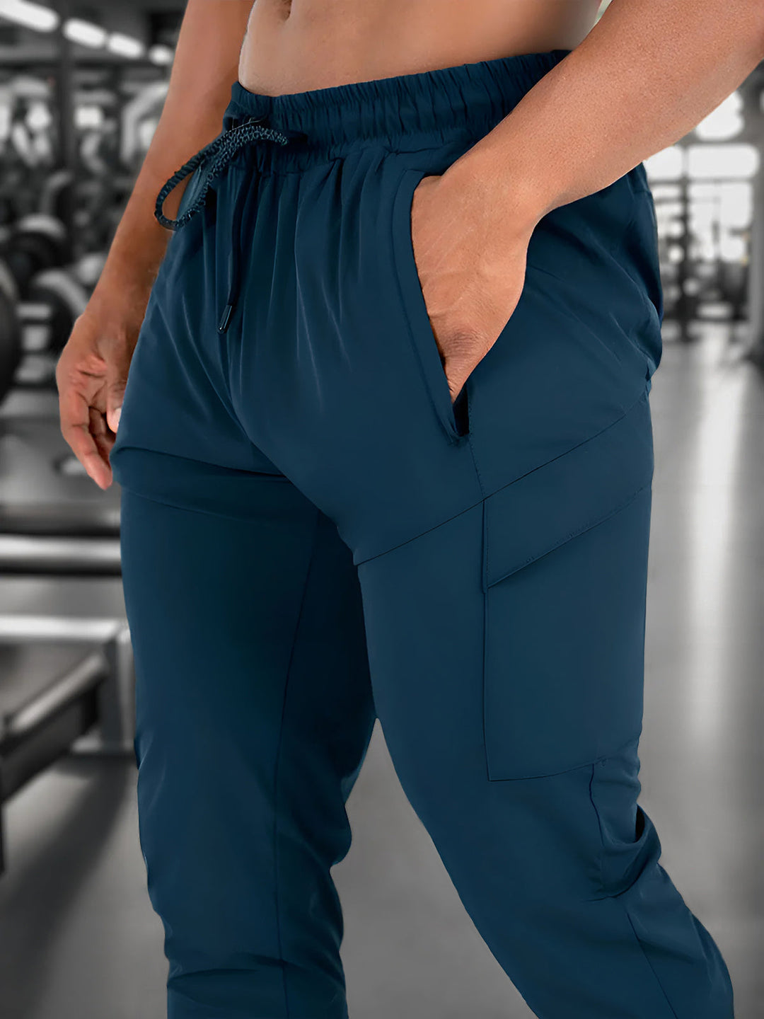 Man showcasing men's performance joggers, highlighting comfortable fit and athletic style.