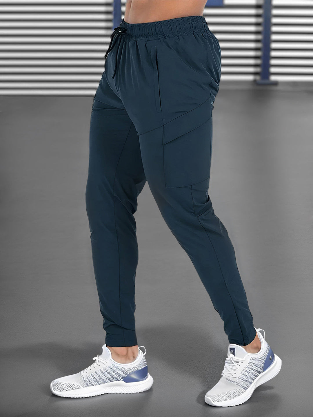 Men's athletic performance joggers for gym workouts. Stretch, quick-dry fabric ensures ultimate comfort.