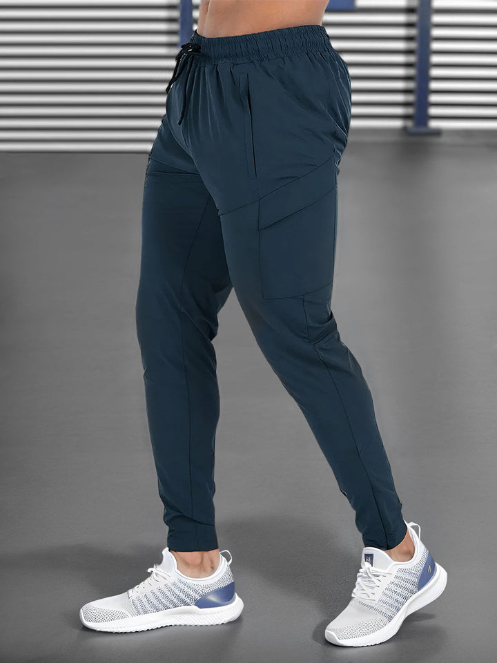 Men's athletic performance joggers for gym workouts. Stretch, quick-dry fabric ensures ultimate comfort.