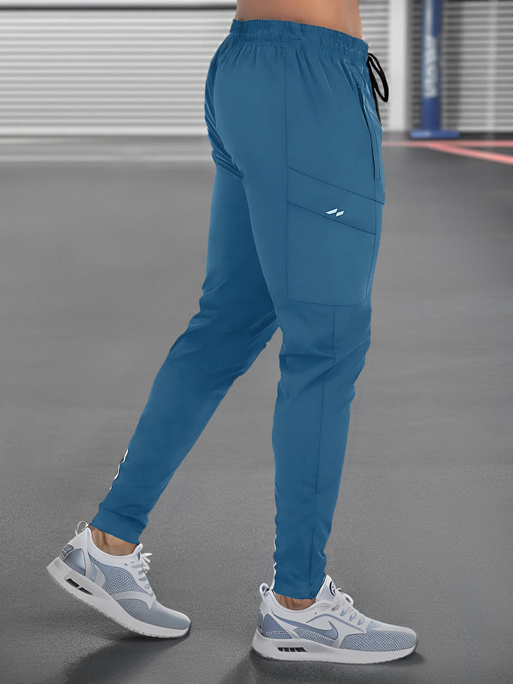 Men's performance joggers in a dynamic pose, perfect activewear for running, gym, or workouts.