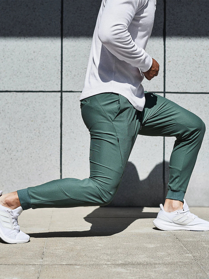 Side profile of men's performance joggers, showing modern fit & athletic style for activewear.