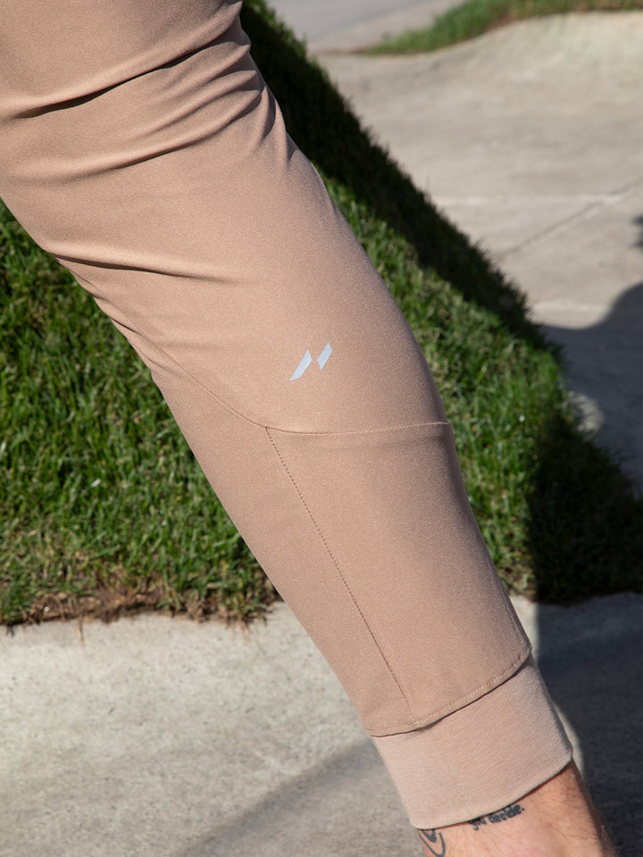 Men's performance joggers with practical pockets, enhancing utility & activewear style.
