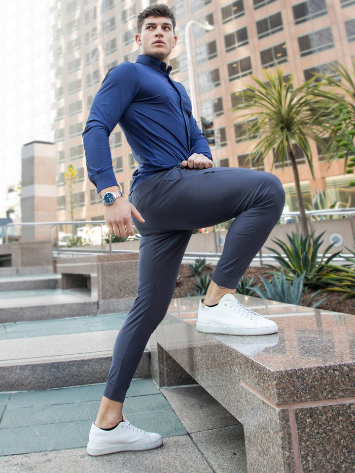 Tapered cuff detail of men's performance joggers, showcasing modern fit & athletic style.