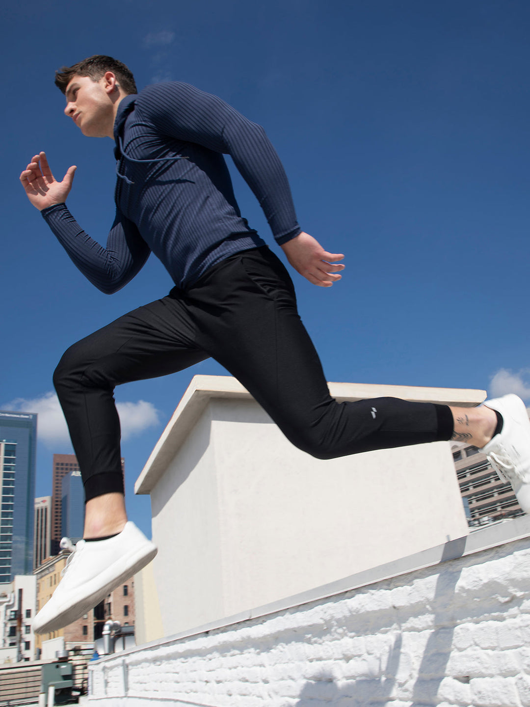 Gray men's performance joggers, comfortable casual wear, gym pants & versatile bottoms.