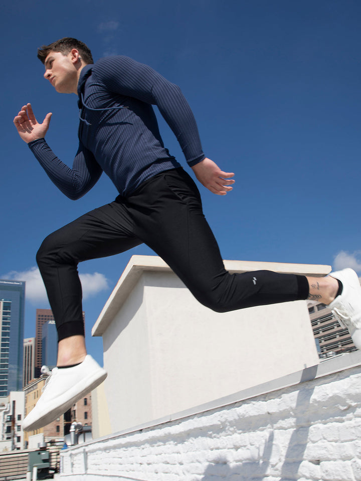 Gray men's performance joggers, comfortable casual wear, gym pants & versatile bottoms.