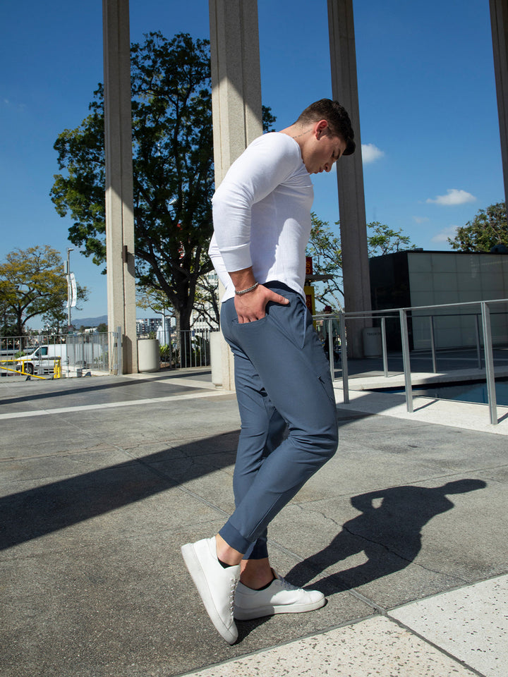 Neatly folded men's performance joggers, ready for active days, gym & casual comfort.