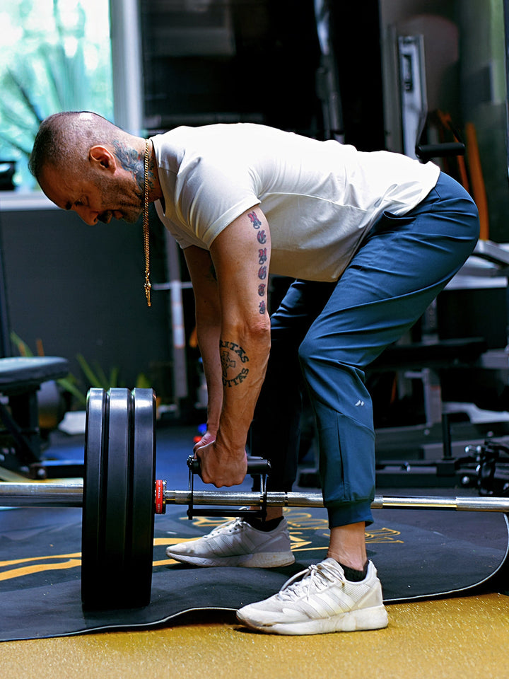 Subtle branding on men's performance joggers, enhancing athletic style & modern activewear.