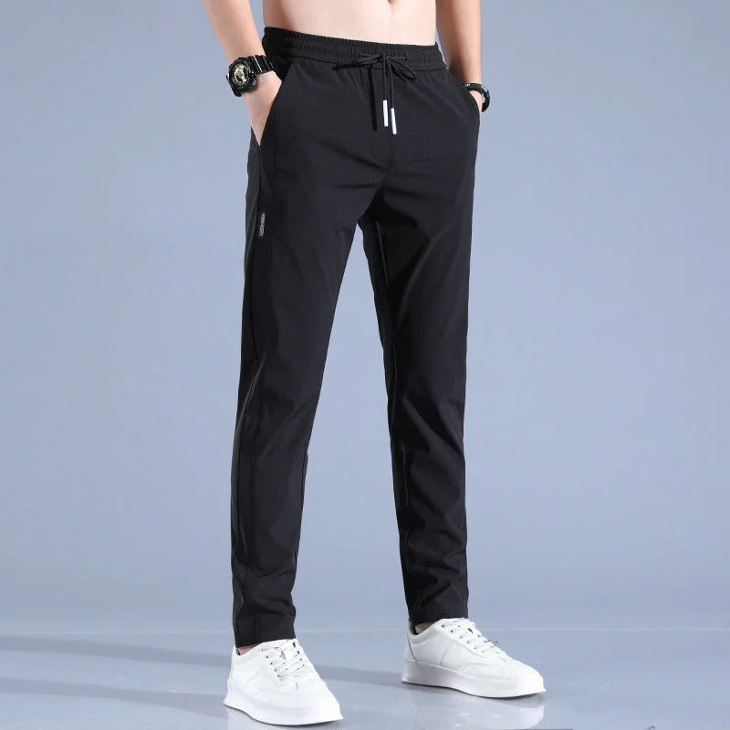 Close-up of flexible men's athletic golf pants fabric, highlighting moisture-wicking and comfortable performance.