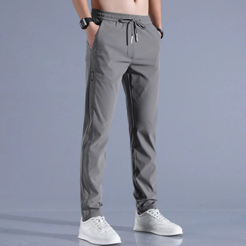 Front view of durable men's long golf pants with practical pockets, ideal for performance and everyday style.