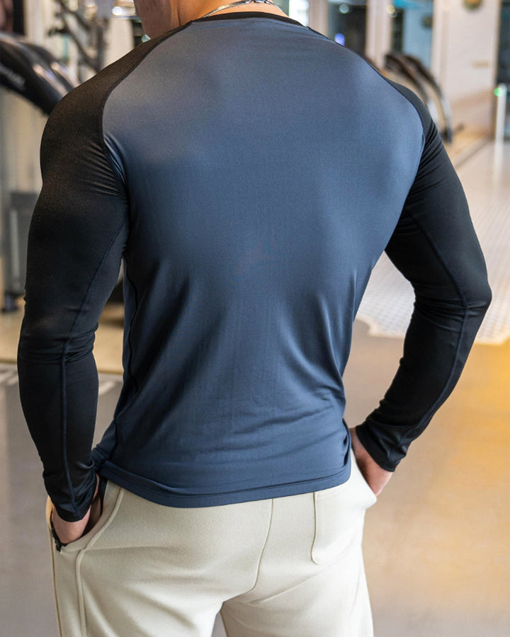 Workout-Ready Men's Long Sleeve with Shoulder Cut, sweat-wicking for intense training.