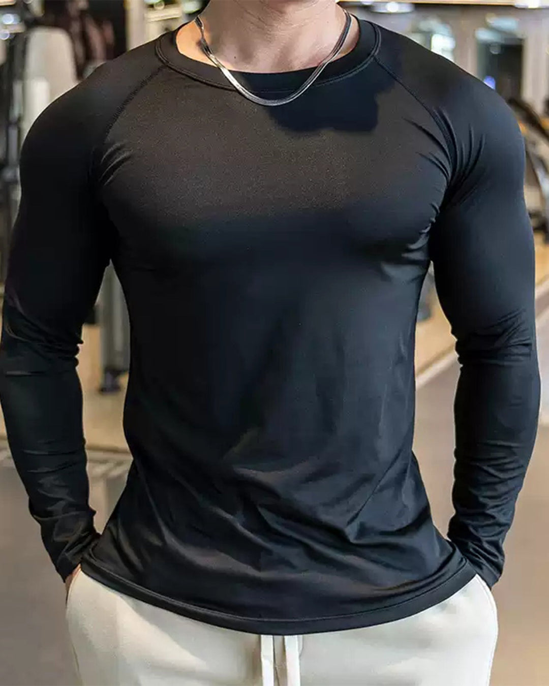 Men's Training Shirt, long sleeve, stretch fit, engineered with a shoulder cut.