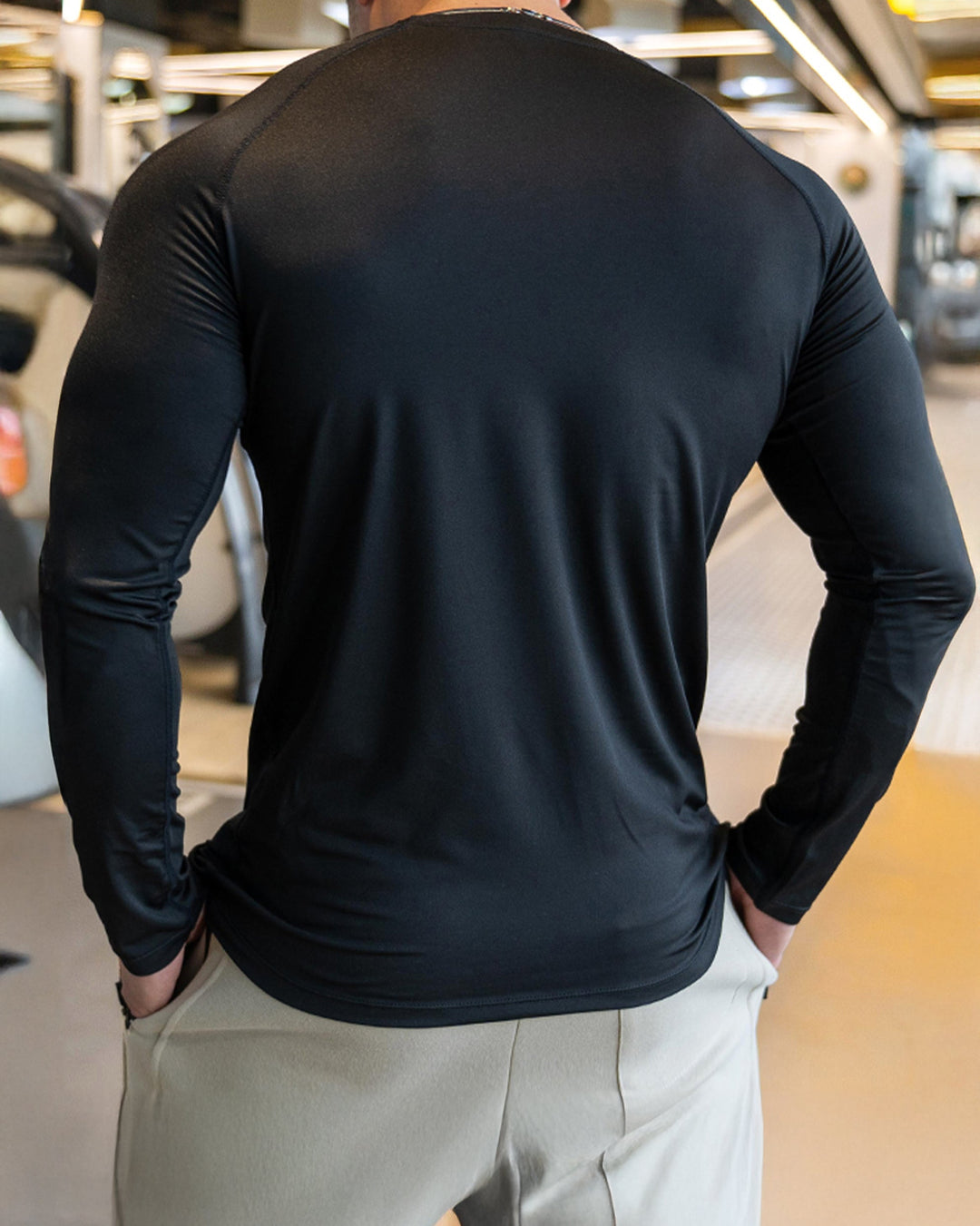 Athletic Men's Long Sleeve Top, moisture-wicking, shoulder cut, activewear.