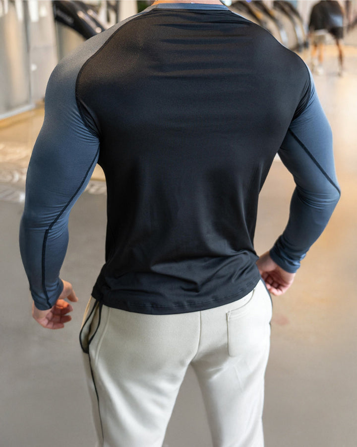 Optimal Men's Workout Shirt, long sleeve, athletic shoulder cut for unrestricted movement.