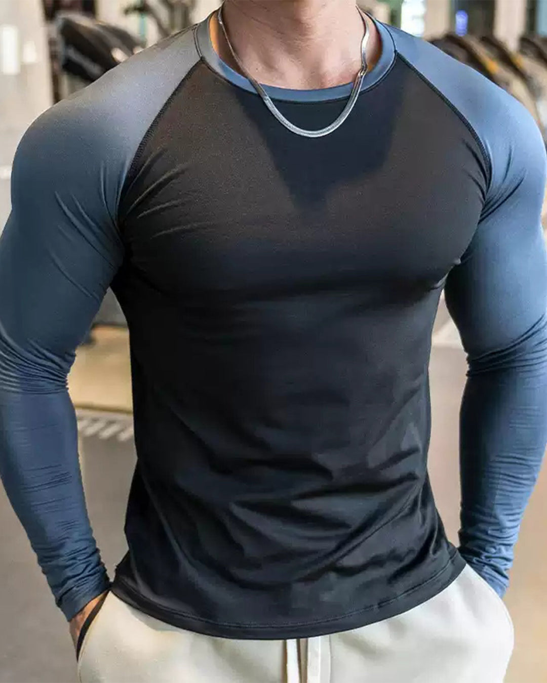 Performance Men's Apparel: long sleeve training shirt with a distinctive shoulder cut.