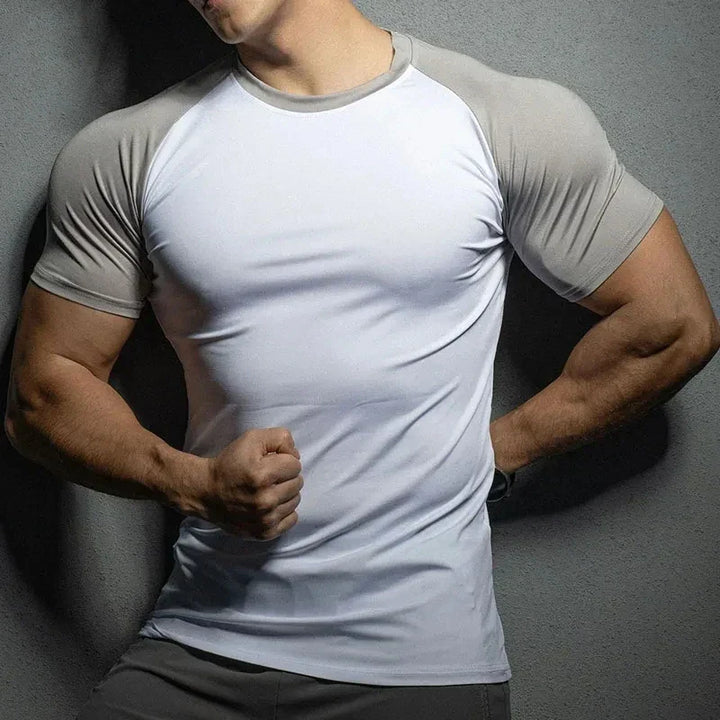 Men's performance muscle-fit short-sleeve shirt for gym wear, bodybuilding & athletic training. Form-fitting design.