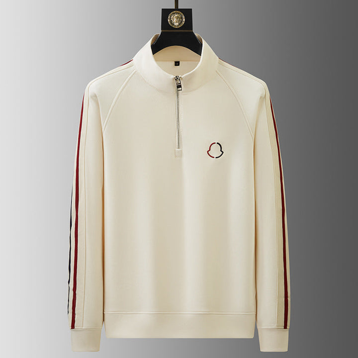 Everyday casual men's tracksuit. Quarter-zip top & track pants for sporty lounge.