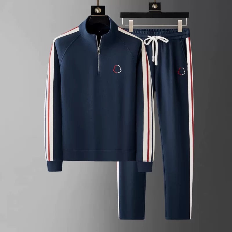 Sporty men's quarter-zip tracksuit. Comfortable lounge set with a tailored fit.