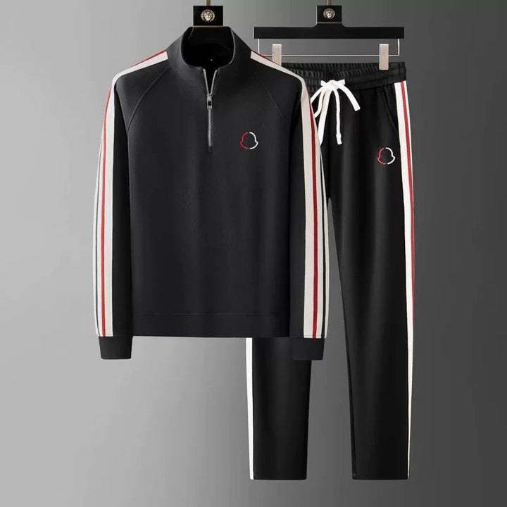 Stylish men's quarter-zip tracksuit set. Tailored for comfort & sporty everyday wear.