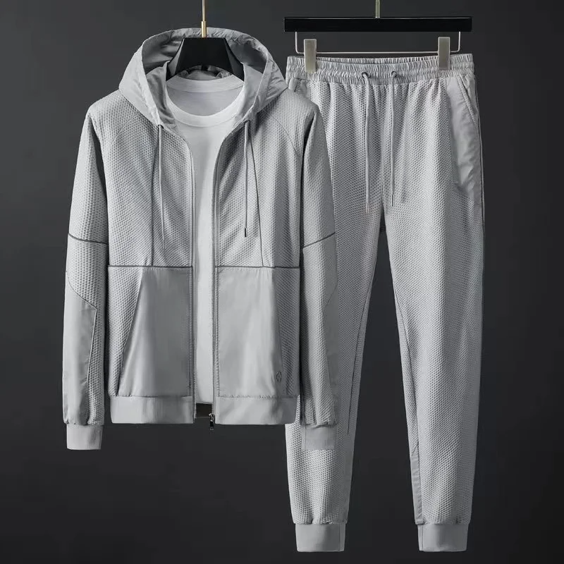 Sleek men's casual techwear tracksuit with a modern design, perfect for everyday urban fashion.