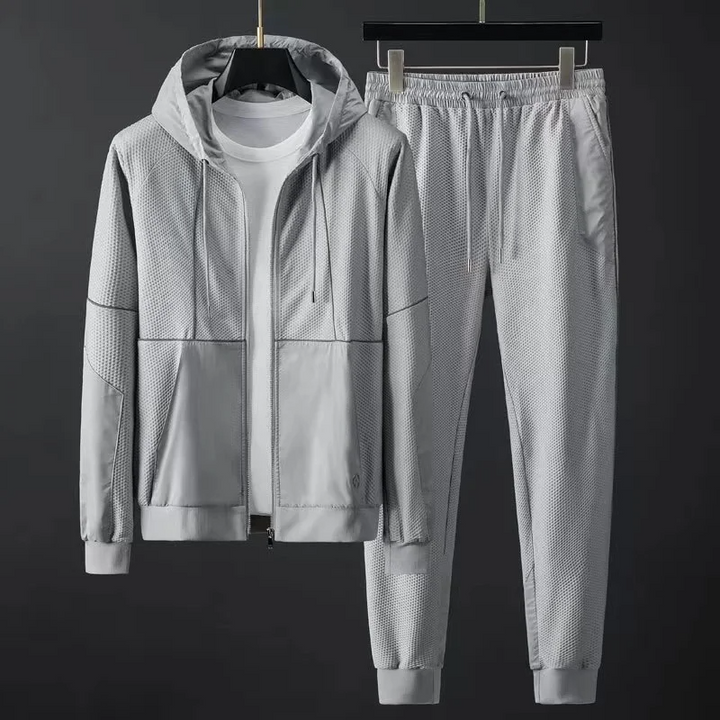 Sleek men's casual techwear tracksuit with a modern design, perfect for everyday urban fashion.