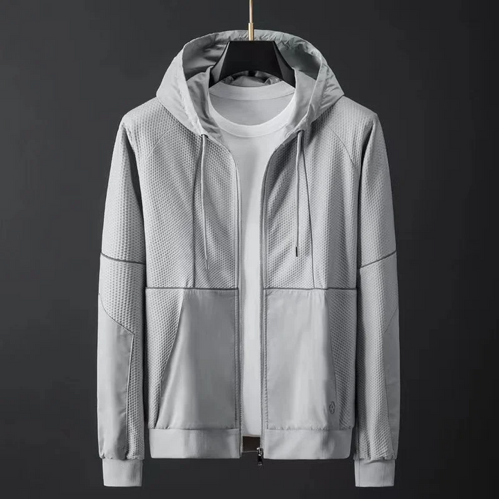 Men's techwear tracksuit set: performance hoodie and comfortable joggers in a sleek black design.