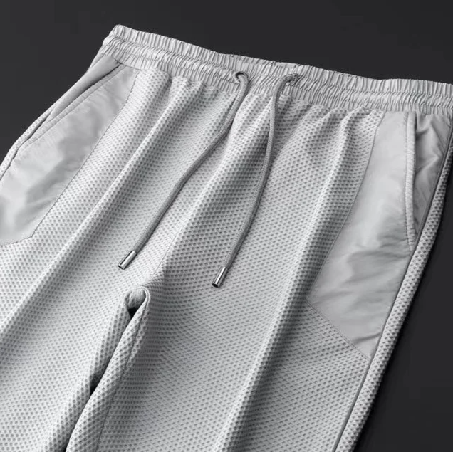 Versatile men's performance techwear tracksuit, perfect for sports, activewear, or sleek streetwear style.