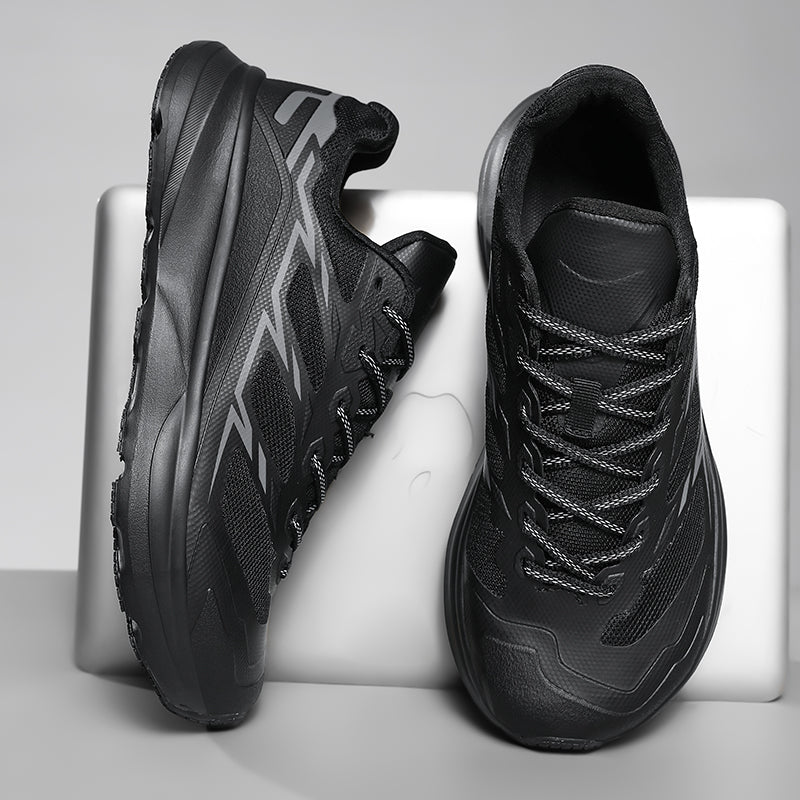 Detail of the breathable mesh upper on men's performance trail sneakers, ensuring cool comfort.