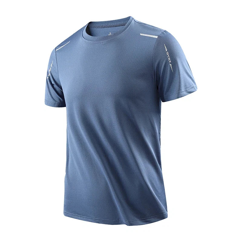 Man running in a men's short-sleeve Velocity Tech Tee. Moisture-wicking activewear designed for peak performance.
