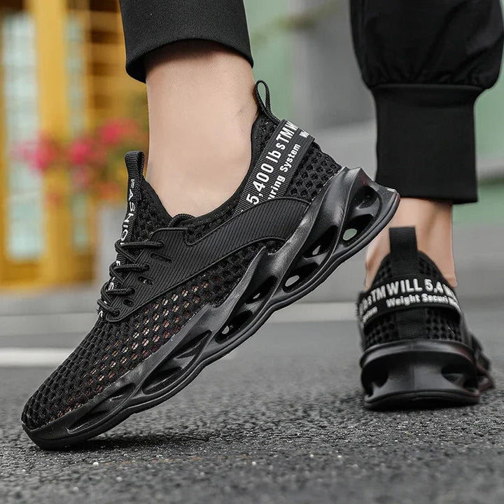 Pair of Men's Phantom Camo mesh running sneakers, ready for training, lightweight & stylish athletic footwear.