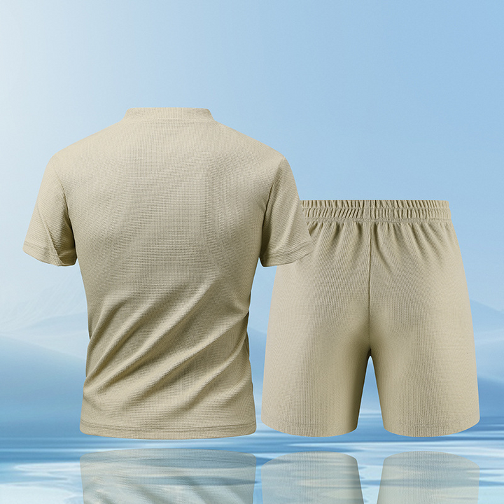 Sporty men's athleisure set, featuring a breathable piqué knit top with a stylish zip collar.