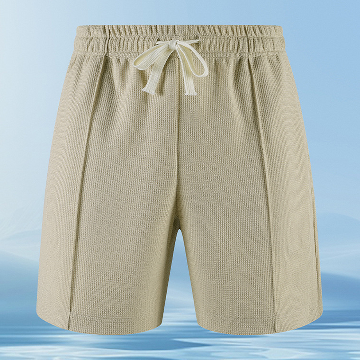 Breathable men's piqué knit casual set, perfect for home lounging or sporty style outings.