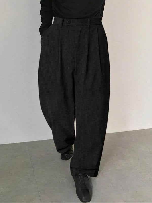 Men's pleated tailored dress trousers in a wool blend. Ideal for formal events, office wear, and sophisticated style.
