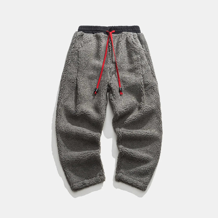Stylish men's plush joggers, relaxed fit for athletic activities & modern streetwear fashion.