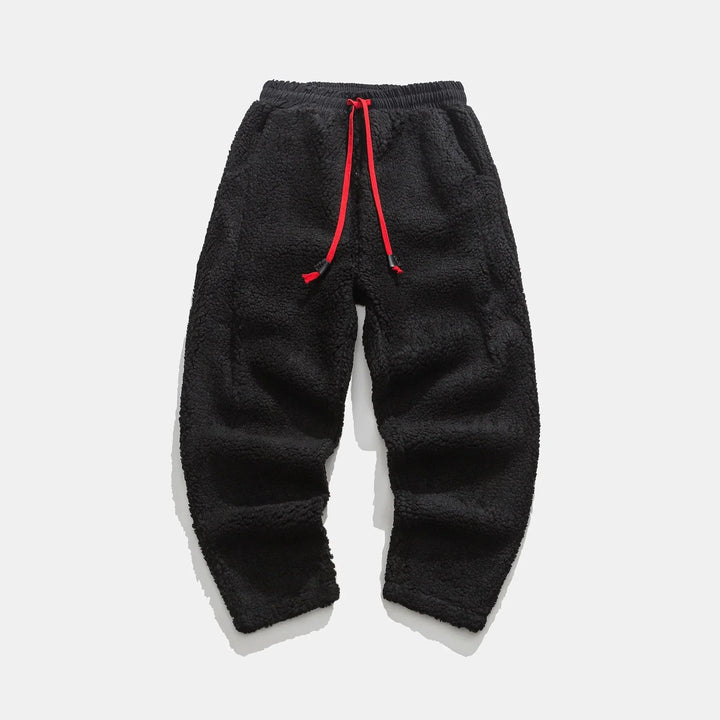 Comfortable men's plush sweatpants for lounging. Drawstring waist & relaxed fit for ultimate comfort.
