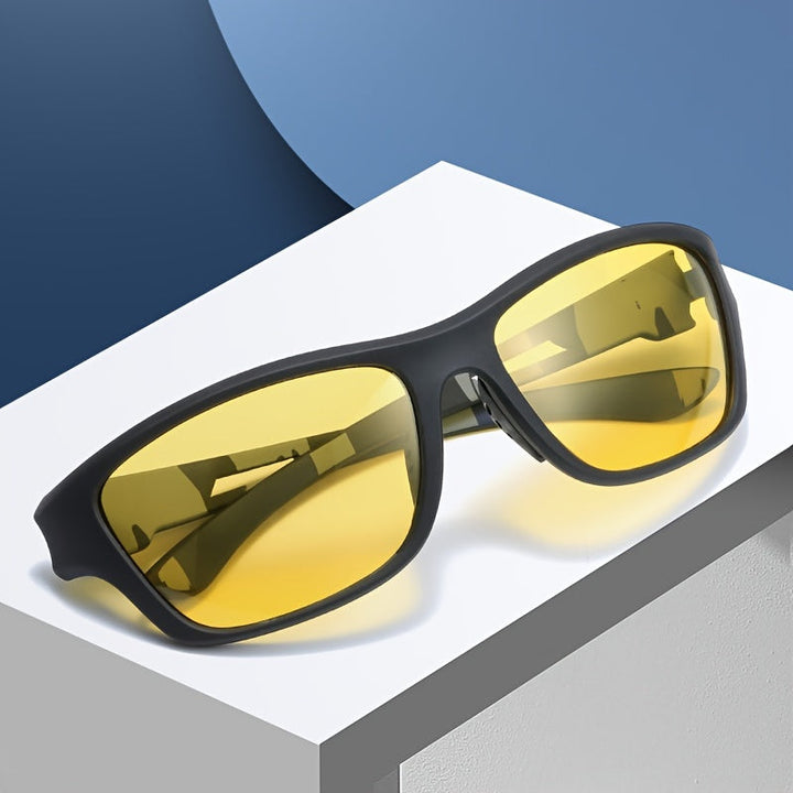Men's polarized sports sunglasses, black frame, enhancing vision & UV protection.