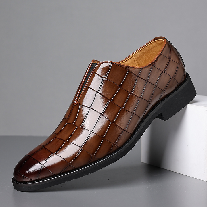 Men's polished black formal dress shoes for business meetings, events, and professional attire.