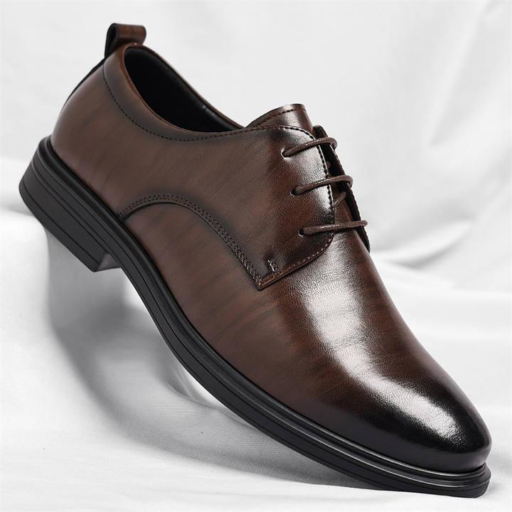 Men's polished black leather dress shoes. Classic, comfortable formal footwear for office & business wear.