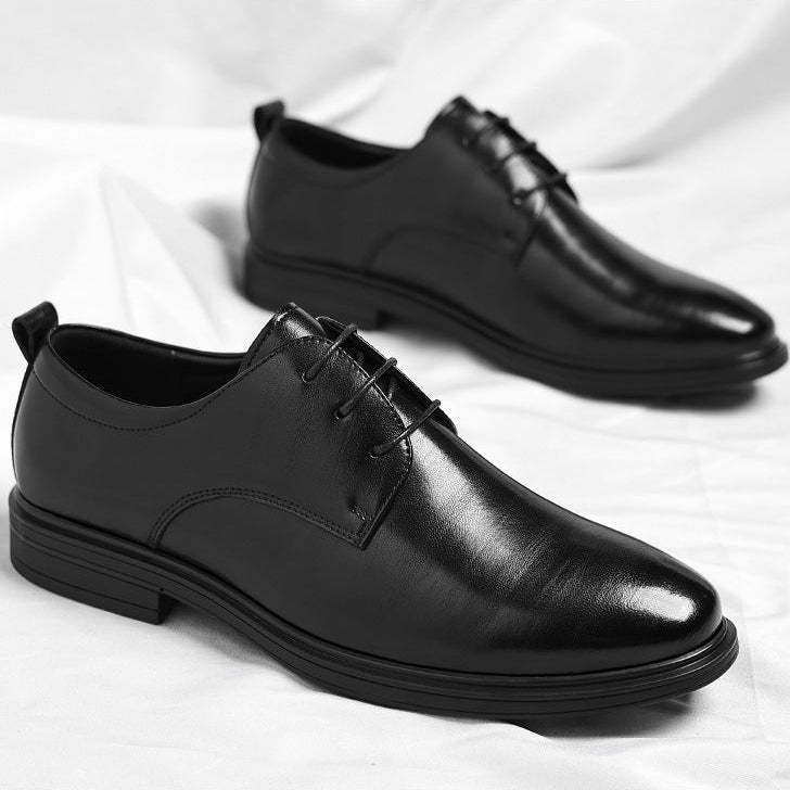 Men's polished brown leather dress shoes, offering sophisticated style and comfort for formal wear.
