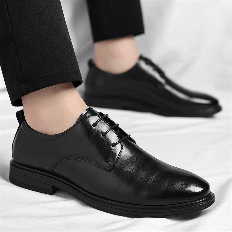Elegant brown polished men's dress shoes, providing comfort and style for any formal or office setting.