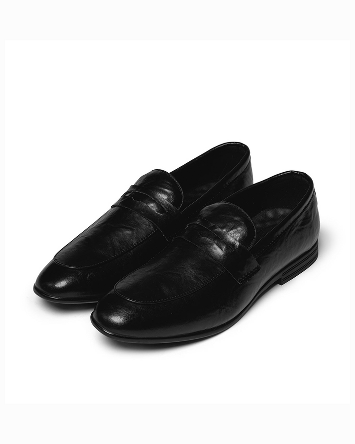 Men's polished black leather slip-on loafers for professional business and formal style.