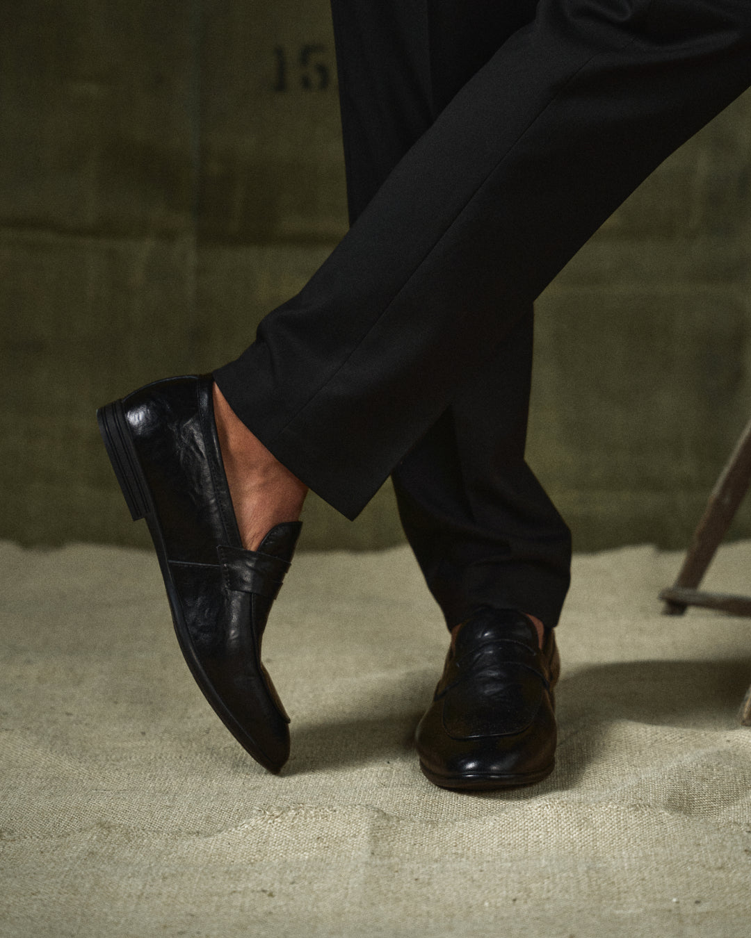 Stylish men's brown polished leather loafers, perfect for business casual and formal wear.