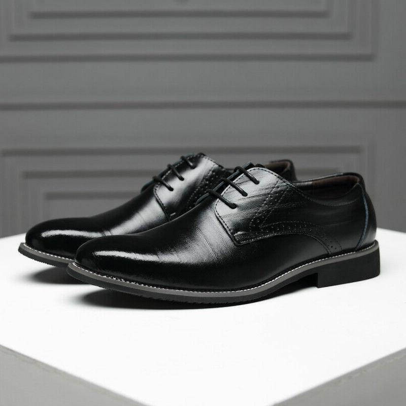 Genuine leather men's oxford shoes, highly polished, offering classic style for business & formal wear.