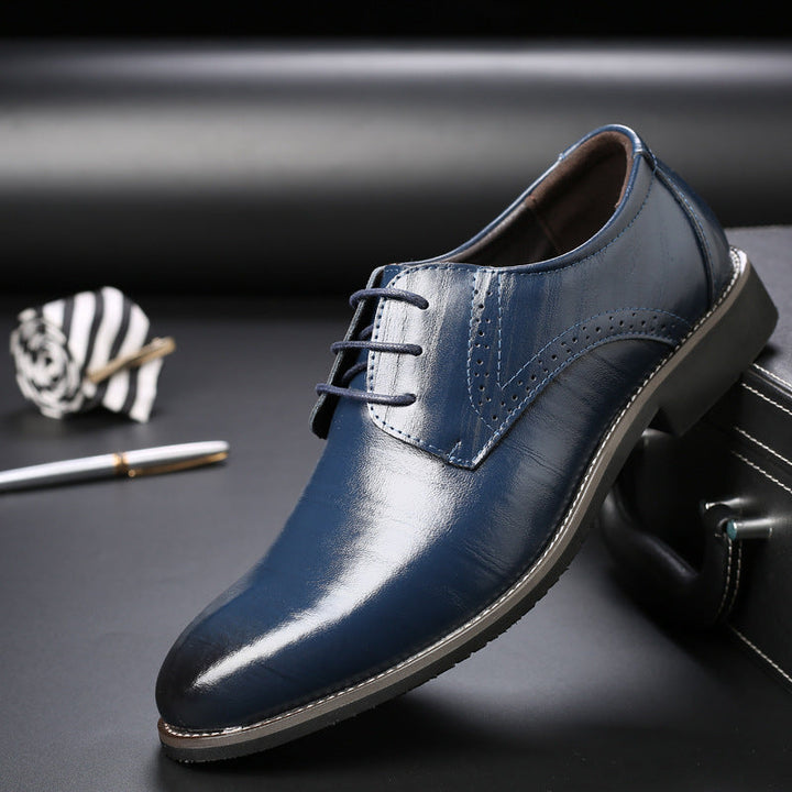 Classic men's leather oxford dress shoes, highly polished for a sophisticated business look.