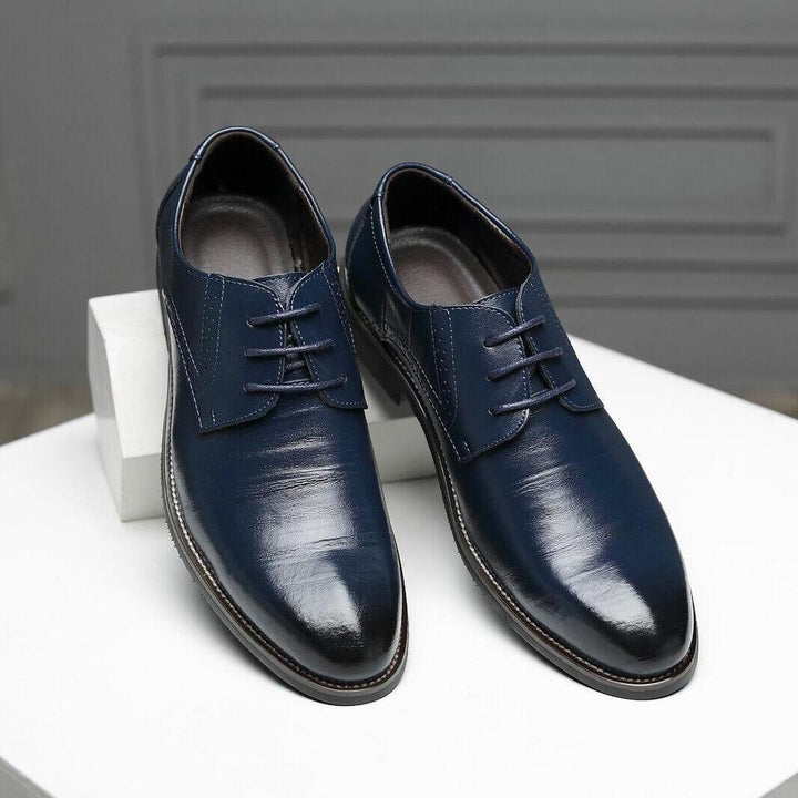 Men's business oxford shoes, polished & elegant, ready for a formal event or office wear.