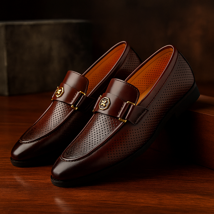 Men's polished black slip-on loafers, ideal for business casual or everyday comfort and style.