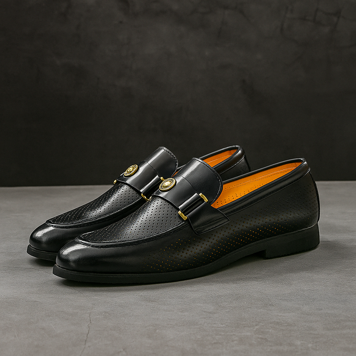 Close-up of men's polished leather slip-on loafers, highlighting stitching and comfortable design.