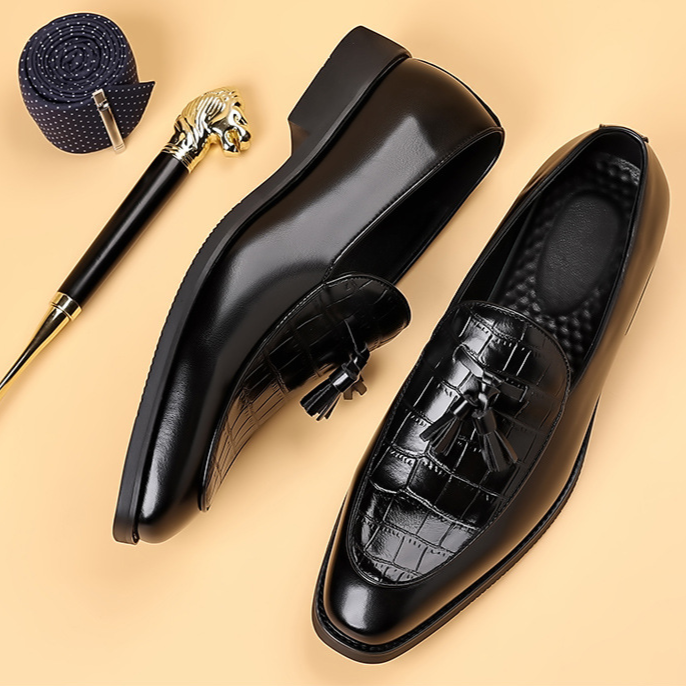 Stylish men's slip-on tassel loafers. Perfect formal or smart casual dress shoes for elegant occasions.